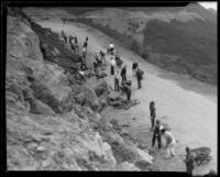 Day laborers work with shovels and wheelbarrows to widen the road through Griffith Park, Los Angeles, 1933