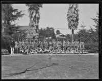 Boy Scouts pose for a group portrait preparing to leave for a national jamboree, Santa Monica, 1935