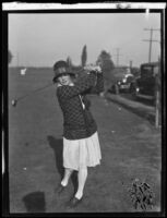 dsi Golfer Leona E. Pressler, first wife of Harry Pressler, working on her golf swing, Los Angeles, 1929