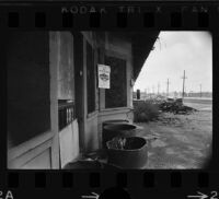 Train station poster advertises revival project in Watts (Los Angeles, Calif.)