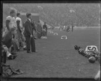 Stub Allison, assistant coach of the Golden Bears, watches during a match with the USC Trojans at the Coliseum, Los Angeles, 1934