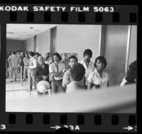 Line of people outside the immigration office in Los Angeles, Calif., 1980