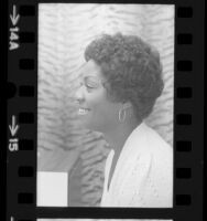 Woman modeling African American hairstyle, 1972