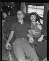 Ann Bagot and her son, Robert, starting deportation journey on a train at Southern Pacific Station, Los Angeles, 1935