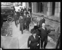 People walking into the courthouse for Arthur C. Burch murder trial, Los Angeles, 1921-1922