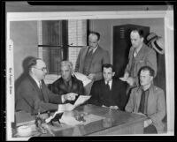 Three suspects in the robbery and murder of Amanda E. Watson are questioned by police, Los Angeles, 1935