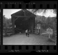 Two children entering Bridgeport Covered Bridge on the Yuba River, Calif., 1966