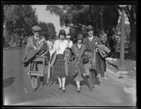 Spectators leaving the Tournament of Roses Parade, Pasadena, 1930