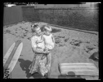 Actress Mae Marsh with her granddaughter in Hermosa Beach, Calif., 1964