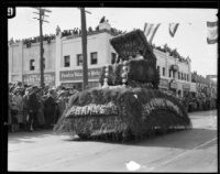 Pasadena Banks float with a woman in a jewelry box in the Tournament of Roses Parade, Pasadena, 1926