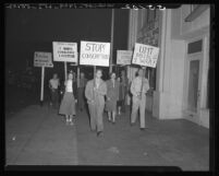 Members of Fellowship of Reconciliation shown marching in protest against draft in Pasadena, Calif., 1948