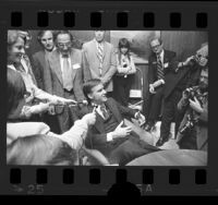 Governor-elect Jerry Brown talking the reporters at his campaign headquarters in Los Angeles, Calif., 1974