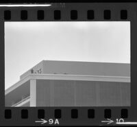 Sniper and lookout atop Century City building in anticipation of President Johnson' arrival, 1967