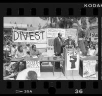 Mayor Tom Bradley and Alan Cranston speaking at divest and Anti-Apartheid rally at UCLA, 1986