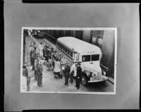 Undocumented immigrants board bus for deportation to Mexico