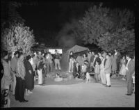 Chavez Ravine residents confer with Councilman Roybal after eviction
