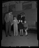 Dick Powell, Joan Blondell, Norman Powell, and Ellen Powell, Santa Fe Depot, Pasadena, 1942