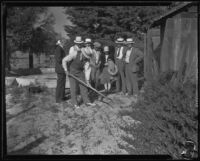 Confessed murderers Koji Hatamoto and Ayako Kanda with detectives at the burial cite of Molly Kanda, Torrance, 1932