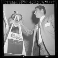 Jim Fregosi, shortstop for California Angels, with model of Anaheim Stadium scoreboard, 1965