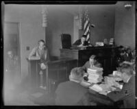 Witness takes the stand during Aimee Semple McPherson's preliminary hearing, Los Angeles, circa 1926