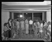 Visitors at an exhibit in the newly opened Griffith Observatory, Los Angeles, 1935