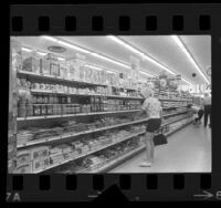 People shopping in a supermarket in Los Angeles, Calif., 1964