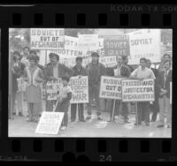 Afghani protesters with signs decrying Soviet occupation of Afghanistan, Los Angeles, 1986