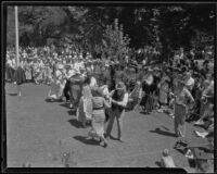 Couples country dancing at the annual Iowa Association picnic at Bixby Park, Long Beach, 1935