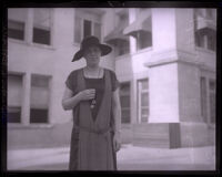 Mills College Dean Katherine R. Adams standing in front of Polytechnic High School, Los Angeles, circa 1925-1926