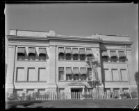 Institutional or commercial building with damaged parapet after the Long Beach earthquake, Southern California, 1933