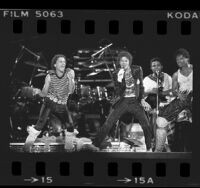 The Jacksons performing on stage during the Victory Tour, 1984