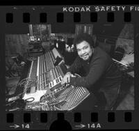 Musician George Duke in control room of recording studio, 1984