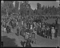 Attendees of the Iowa Picnic in Bixby Park stroll on the lawn, Long Beach, 1935