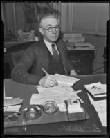 Lon W. Butler at his desk, Los Angeles, 1936