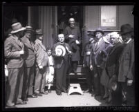 Exiled Bishop Manuel Azpeitia Palomar and priests at a train station before their return to Mexico, Los Angeles, 1929