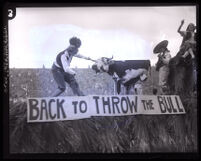 USC Homecoming float, "Back to Throw the Bull," with a Trojan taking on a Bull, Los Angeles, 1925