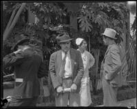 Three unidentified men and a nurse charged with the care of Mrs. Fleeta Gettle at the Gettle home, Beverly Hills, 1934