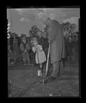 Clarence A. Dykstra, UCLA Provost, and first-grader Jeannie Morgan break ground for University Elementary School at UCLA, 1949