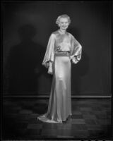 Model Elsie McDonald in satin negligee, Times Fashion Show, Los Angeles, 1936