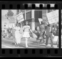 Satirical anti-feminist participants in Doo Dah Parade, Pasadena, Calif., 1986