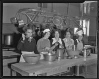 Friday Morning Club members pose while cooking for a Christmas luncheon, Los Angeles, 1935