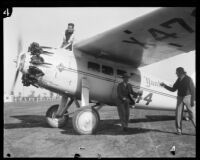 Captain C.B.D. Collyer and Harry Tucker with their monoplane Yankee Doodle, Los Angeles, 1928