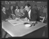 Chang Shu-chi demonstrates Chinese method of painting before a class of students at Otis Art Institute, Los Angeles, Calif