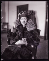 Betty Carroll seated in a chair, Los Angeles, 1927