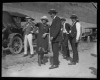 Peggy Caffee, witness of the murder of Alberta Meadows, points to the location of the crime to police detective Sergeant Dwight Longuevan, Los Angeles, 1922