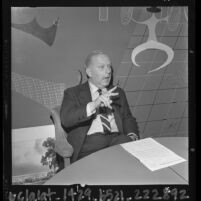 Advertising executive, William Bernbach at press conference discussing his stance against cigarette advertising, Calif., 1964