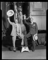 Evangelist Billy Sunday, wife Helen "Ma" Sunday, and son Paul Sunday near train, [1931?]