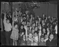 Children putting their hands up at California Babies Hospital, Los Angeles, 1938