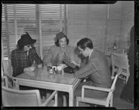 Mrs. Richard Hyde, Manuela Hudson Vanderbilt and Alfred Gwynne Vanderbilt at the Santa Anita Park Turf Club, Arcadia, 1938