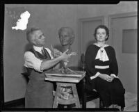 Roger Noble Burnham sculpting a bust of Frances Whitesell, circa 1935-1939